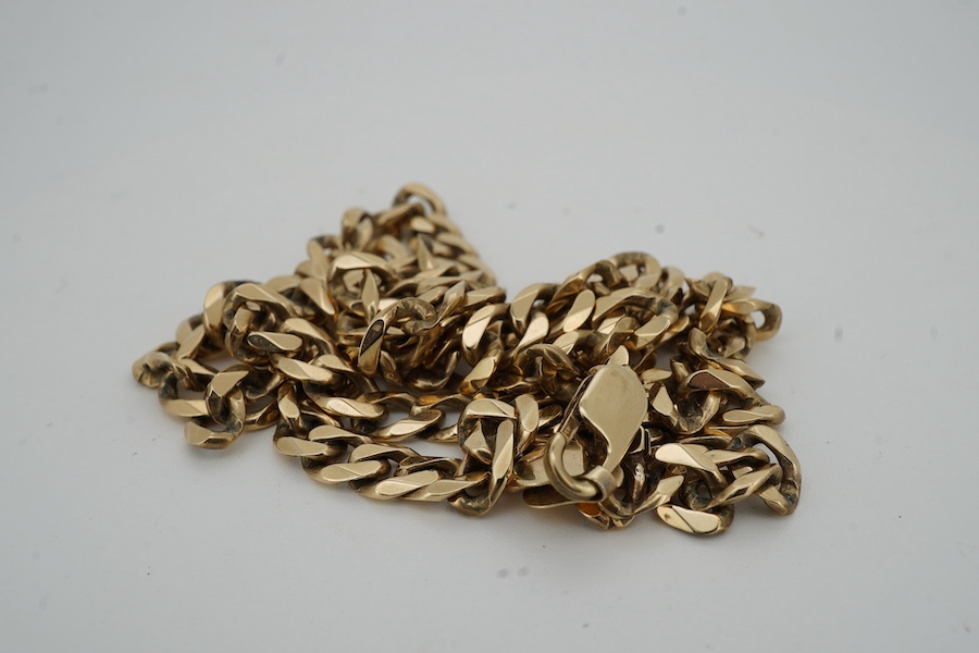 A gold chain necklace, composed of flat curb linking, length 57cm, stamped 375, gross weight 31 grams